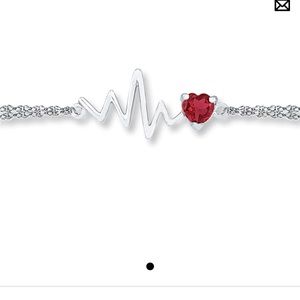 Kay Jewelers sterling silver heartbeat bracelet with Ruby stone